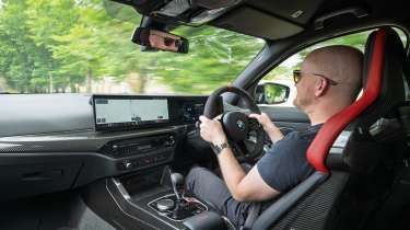 Auto Express contributor Alex Ingram driving the BMW M3 CS Touring