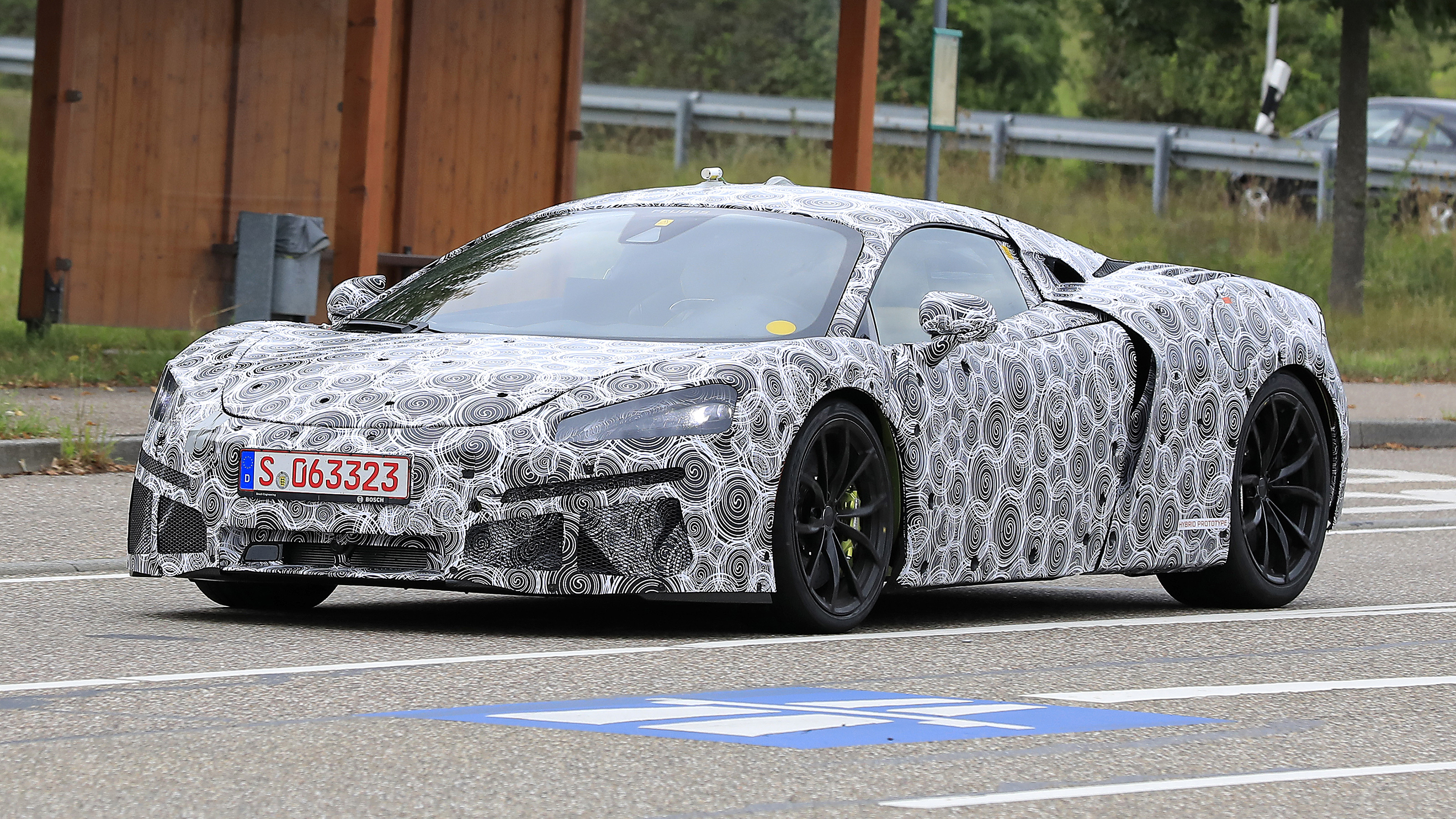 New hybrid McLaren Sport Series supercar spied  Auto Express