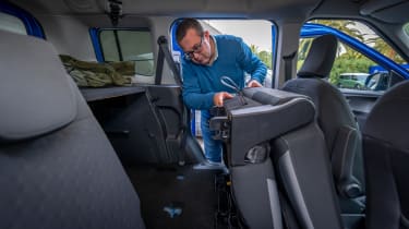 Auto Express editor-at-large John McIlroy folding the Ford Tourneo Courier&#039;s back seat
