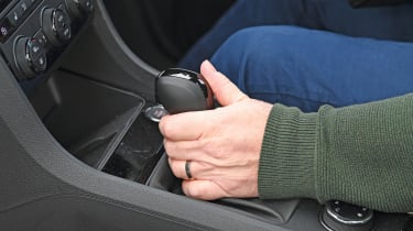 Hand on gearshifter