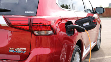 New 2019 Mitsubishi Outlander PHEV plugged in