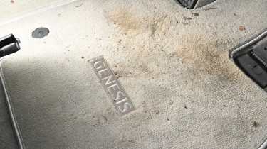 Genesis GV60 - dirty floor mat