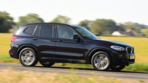 BMW-X3-PHEV-profile-driving.jpg