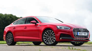 Red Audi A5 Sportback - front side tracking.
