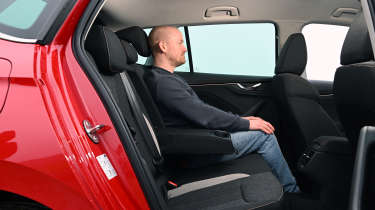 Jaecoo 7 and Skoda Kamiq - Skoda Kamiq rear seats being sat in by Auto Express chief reviewer Alex Ingram 