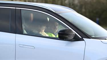 Alex Ingram and Victoria Coquet sitting in a Renault Scenic