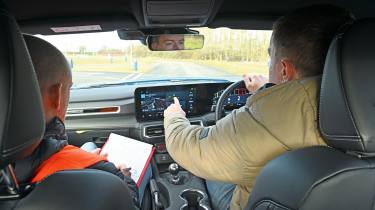 Auto Express senior content editor Shane Wilkinson driving the Ford Mustang