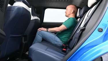 Former Auto Express chief reviewer Alex Ingram sitting in the Alpine A290's rear seat
