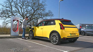 EV charging hacks - rear of R5 in front of Tesla point