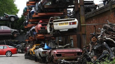 Rusty pile of cars