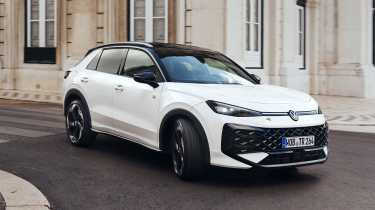Volkswagen T-Roc 2026 - front angled cornering white