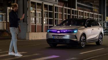Prototype Vauxhall SUV - purple hand light on zebra crossing