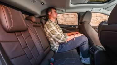 New DS No4 - rear seats being sat in by Auto Express senior news reporter Alastair Crooks