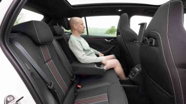 Skoda Kamiq - rear seats with Chief reviewer Alex Ingram