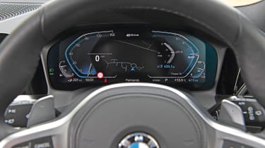 Peugeot 508 SW Sport Engineered vs BMW 330e xDrive Touring - 330e instrument cluster