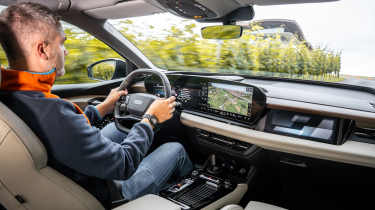 Richard Ingram driving the Audi Q6 e-tron