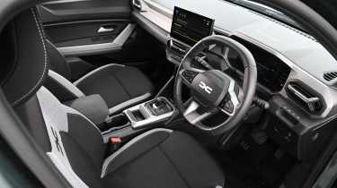 Dacia Duster Hybrid - front interior 