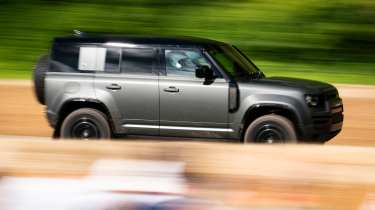 Land Rover Defender OCTA - side action