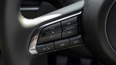 Mazda 3 steering wheel audio controls