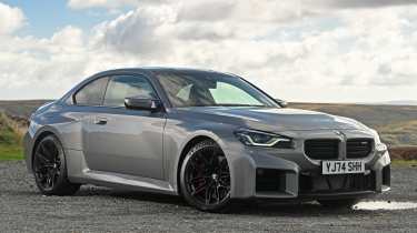 New BMW M2 being driven in the UK - front static 