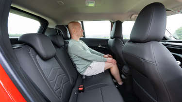 Auto Express chief reviewer Alex Ingram sitting in the Jeep Avenger&#039;s back seat
