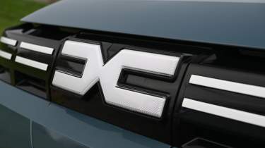 Dacia Spring - front grille and charge port
