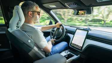 Auto Express deputy editor Richard Ingram driving the Volvo EX90