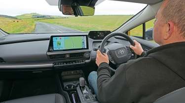 Auto Express contributing editor Steve Sutcliffe driving the Toyota Prius