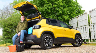 Auto Express editor-at-large John McIlroy sitting in the Jeep Avenger&#039;s boot