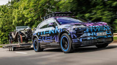 Porsche Cayenne Electric - front 3_4 towing a vintage car