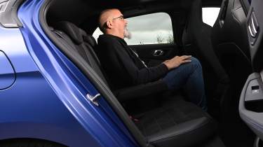 Dean Gibson sat in the BMW M135 xDrive