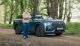 Auto Express senior content editor Shane Wilkinson standing next to the Jaecoo 8