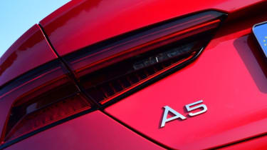 Red Audi A5 Sportback - back tracking close-up.