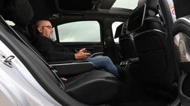 Mercedes AMG S63 e Performance - rear seats being sat in by Auto Express senior test editor Dean Gibson 