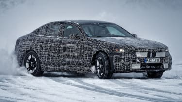 Camouflaged BMW i5 winter testing (official picture) - front drifting