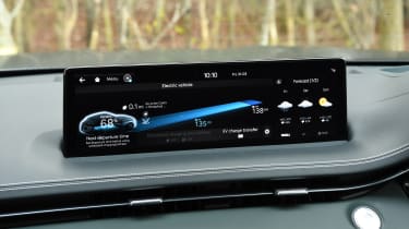 Genesis Electrified GV70 - infotainment touchscreen displaying home screen menu