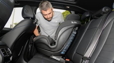 BMW iX3 M Sport Pro - rear seats feat. child seat