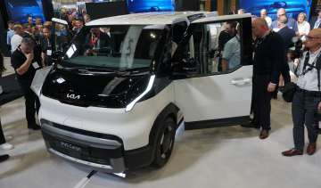 Kia PV5 Cargo on display at Commercial Vehicle Show - front 3/4