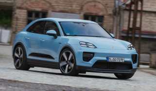 Porsche Macan Electric - front cornering in town
