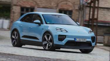 Porsche Macan Electric - front cornering in town