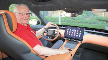 Dirk Branke sitting in the Xiaomi YU7