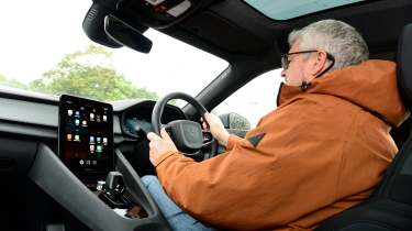 Auto Express consumer editor Chris Rosamond driving the Polestar 2