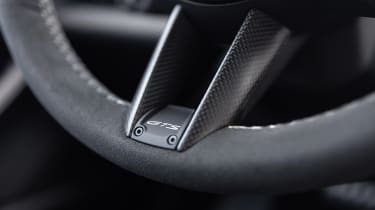 Porsche Taycan GTS - steering wheel badge