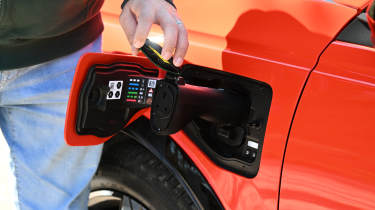 Nissan Micra - charging port with 3-pin adaptor fitted