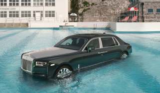 Rolls-Royce Phantom driven into a pool as part of the luxury saloon&#039;s 100th birthday celebrations - front 