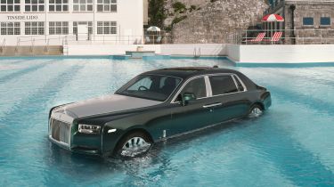 Rolls-Royce Phantom driven into a pool as part of the luxury saloon&#039;s 100th birthday celebrations - front 