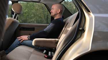 Alex sitting in the Ford Sierra