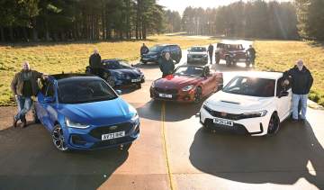 Auto Express team members standing with their favourite outgoing cars