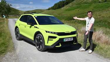 Auto Express consumer reporter Tom Jervis standing next to a Skoda Elroq vRS
