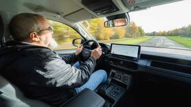 Dean Gibson driving the Toyota Hilux